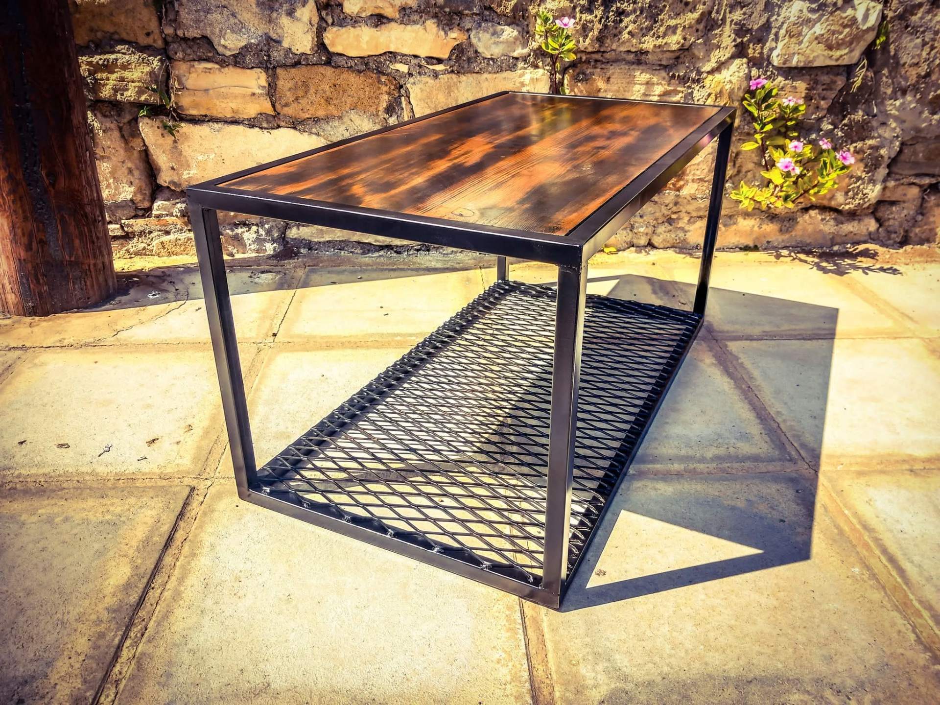 Custom steel coffee table with solid wood top and expanded metal shelf